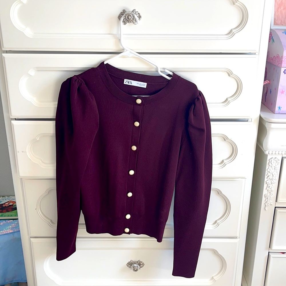 Button down cardigan. Size L but fits like a M.